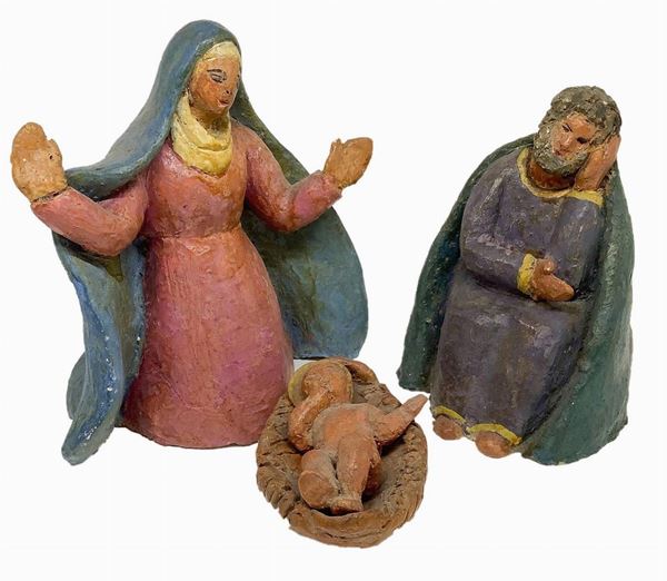 Piccolo presepe Naif in terracotta policroma composto da Madonna, San Giuseppe e Bambino Gesù, Caltagirone. Inizi XX secolo. H cm 16; 13.