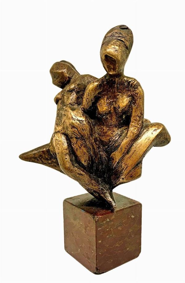 Bronze depicting three women hanging, with brown marble base. H 23 cm

