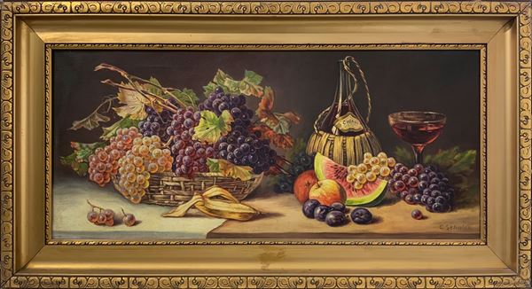 Dipinto ad olio su tela raffigurante natura morta di frutta, inizi XX secolo. Firmato in basso a destra C. Schulze. Cm 40x90, in cornice cm 58x108