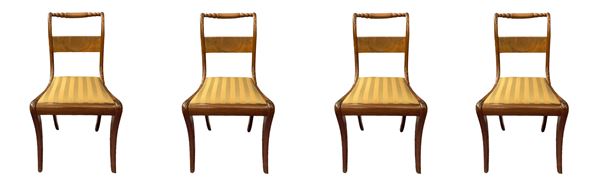 Four chairs, back straight, feet saber. H 81 cm H seat cm 41 cm 45x35