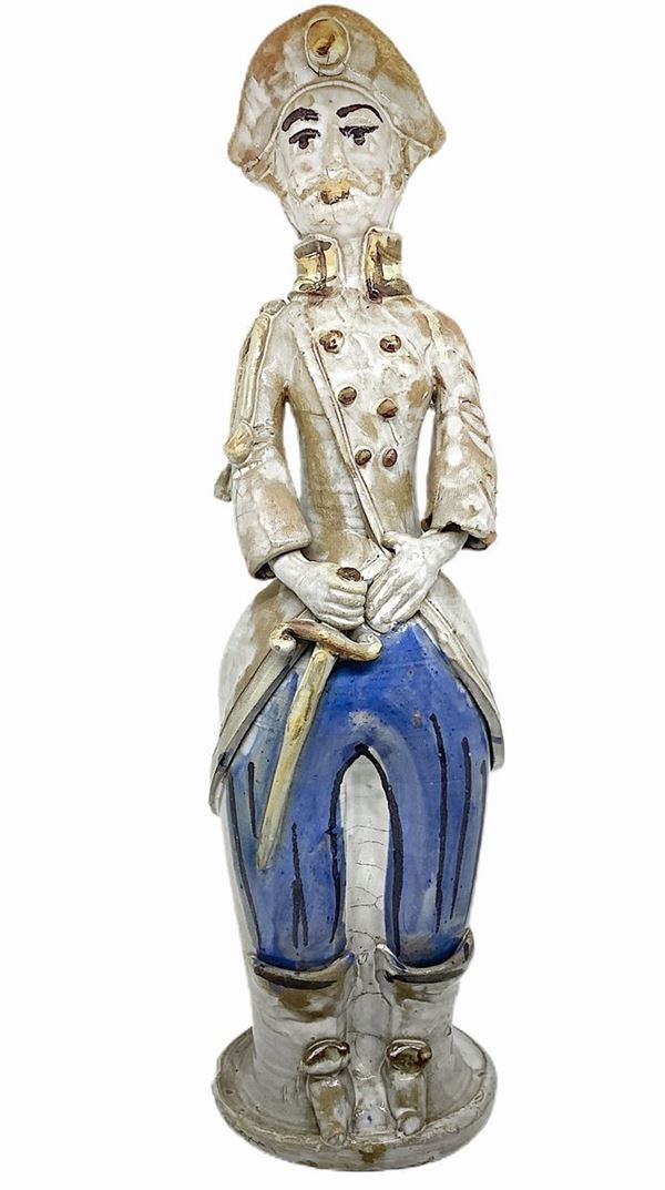 Lumiera in Caltagirone majolica representing man. H cm 42. Small lack