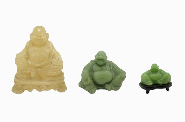 Buddha in giada bianca cm 18; buddha verde, cm 10; buddha verde, cm 8