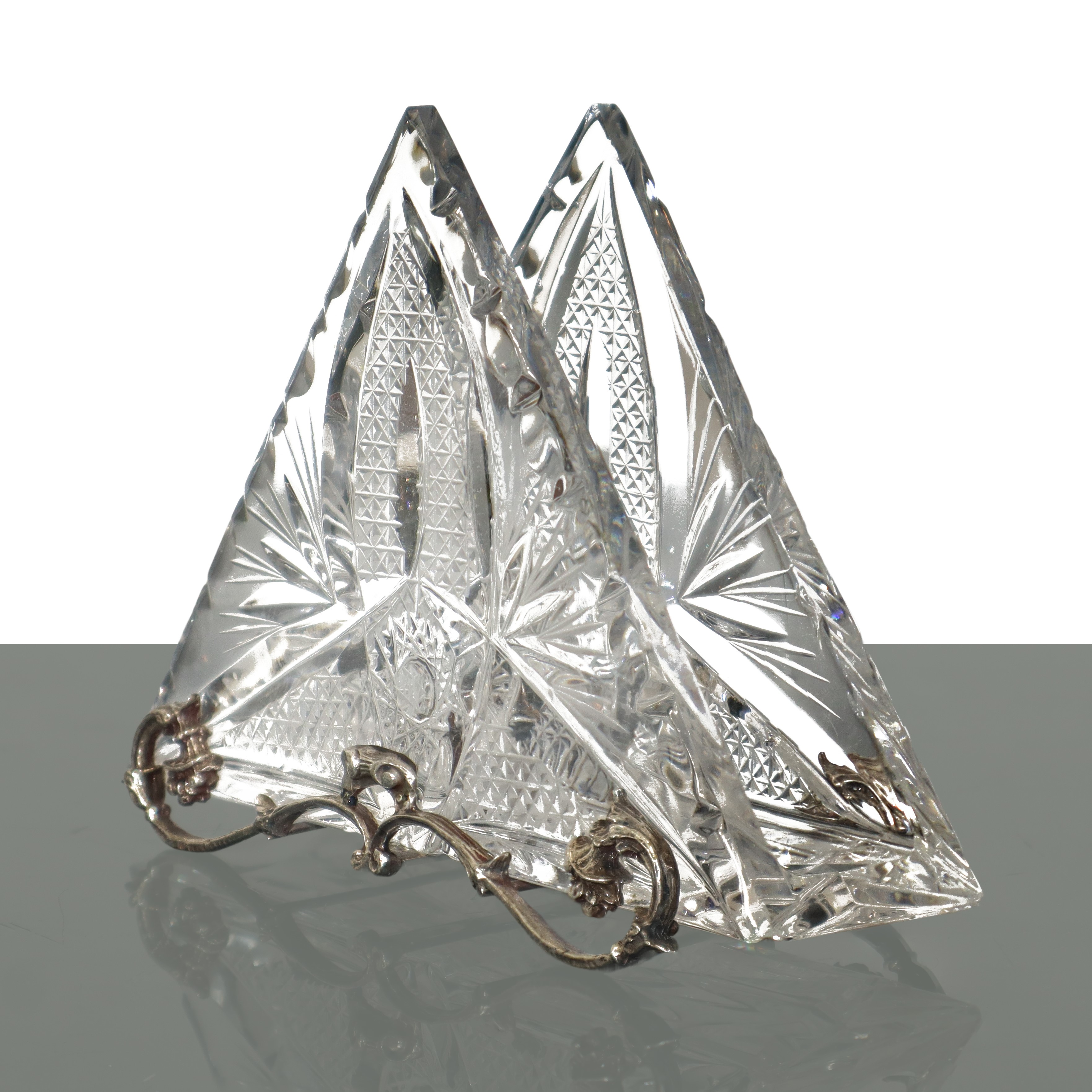 Portatovaglioli in argento 800 e cristallo.