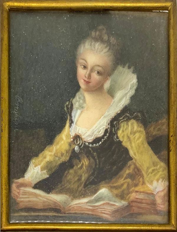 Miniatura raffigurante donna, in cornice in filigrana, fine XIX secolo. Cm 7,5x6. 