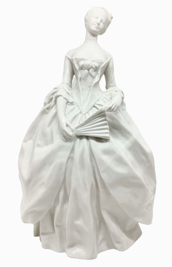 White Capodimonte porcelain depicting lady with Fan. XX century. H 25 cm