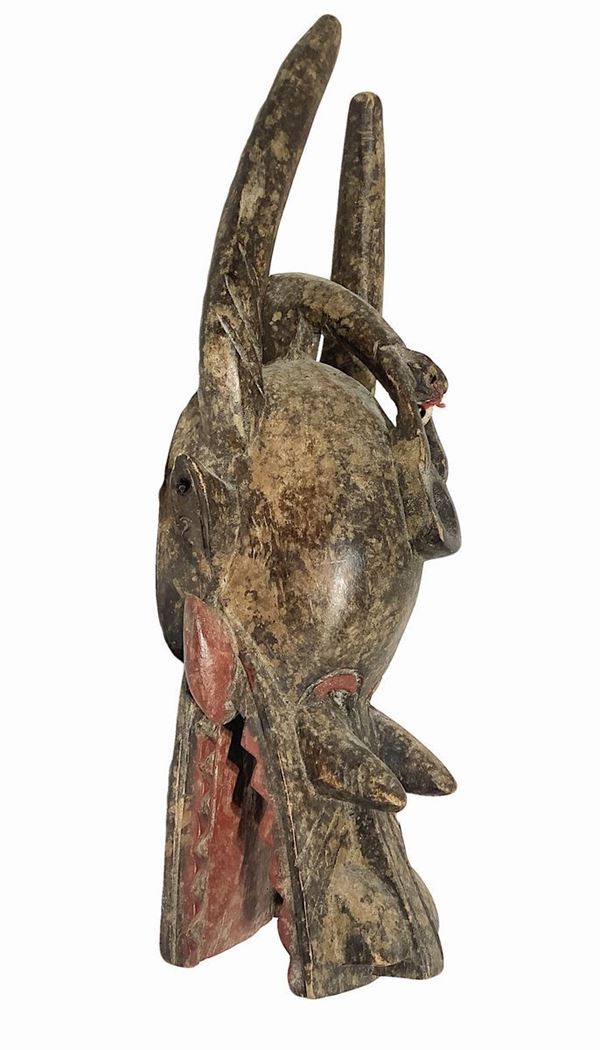 Mask Baule's helmet, Ivory Coast, late twentieth century. H 45 cm