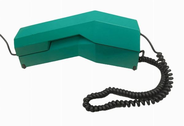 Produzione italiana, apparecchio telefonico in plastica modello diamante nei toni del turchese. Anni â€™70,Da testare.
Cm 8,5x22x8