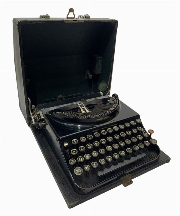 Portable Remington typewriter in original case.