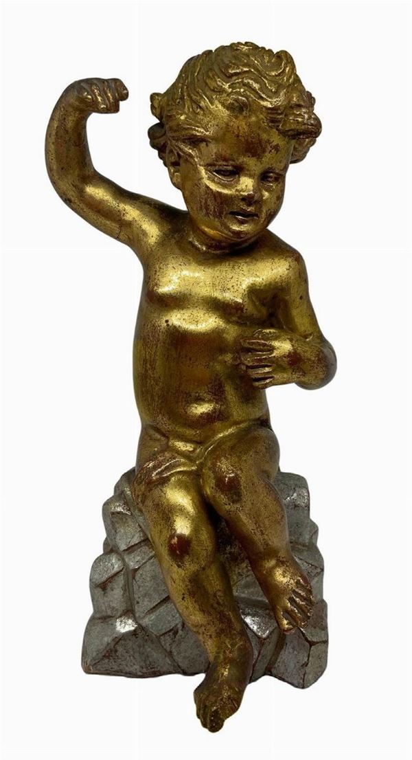 Statuette in gilded wood Depicting cherub. H 28 cm.