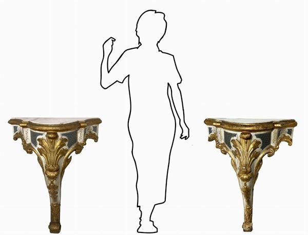 Two small wall console in gilded wood. Early '900. H 25 cm H 27 cm.