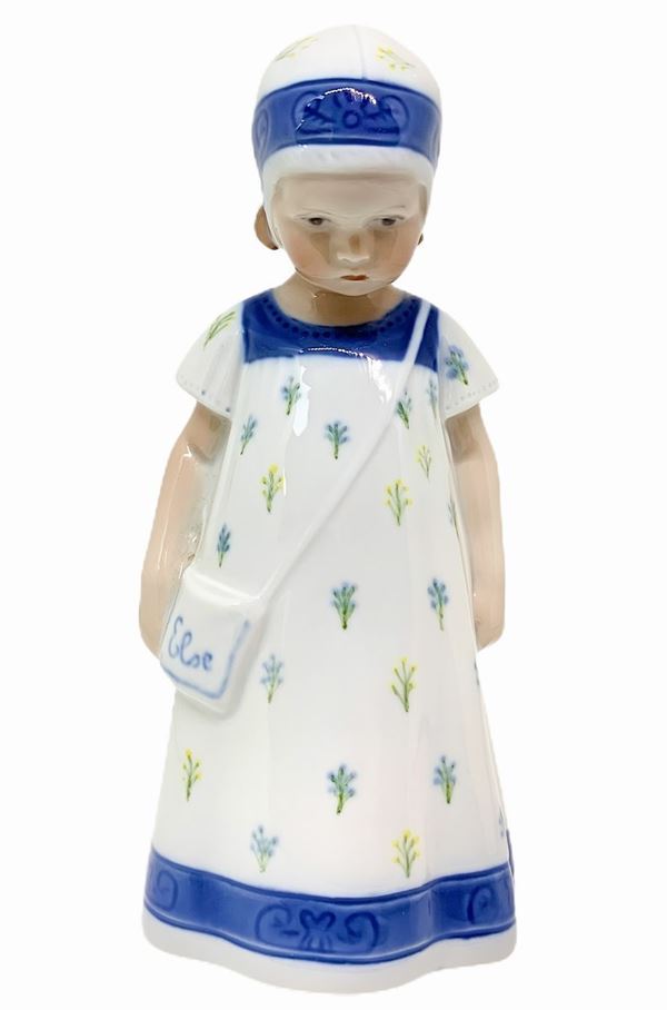 Copenhagen porcelain figurine depicting a child with borsa.Limited edition. H 18 cm