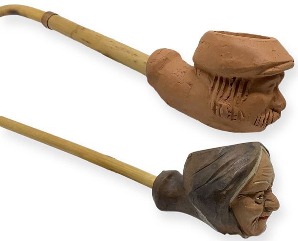 Pair of pipes. 5 - "sleeping farmer." Catania, Sicily. First half of 1900.
Pipa with cooker and torch clay, reed and mouthpiece bamboo, copper finishes.