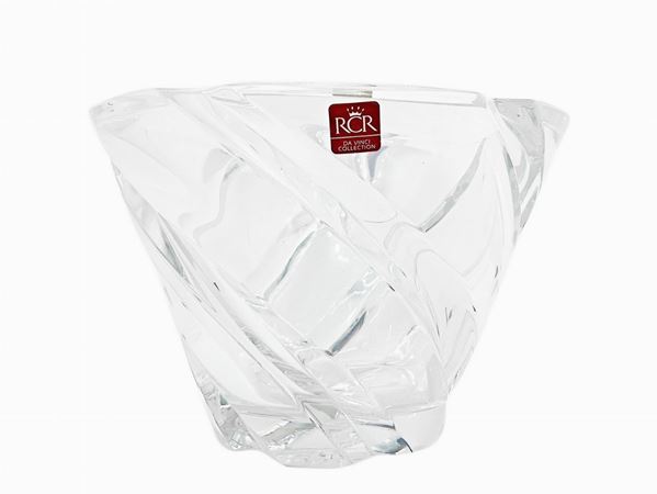 Vaso in cristallo di forma troncoconica con profonde costolature incise, firmato Collection da Vinci. 
Cm 15x22,5