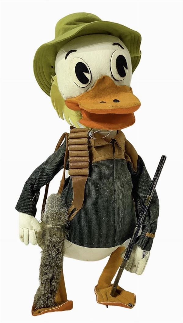 Donald Lenci with rifle, cartridges, fur and shoulder strap, 80, h 48 cm, to be shot at some point, no holes and worms