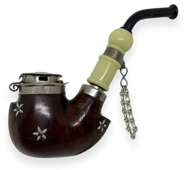 "Pipa Walking with Stelline" - Germany. Early '900.
Long walking with stove pipe and torch briar, cane galalith, ebonite mouthpiece and finishes in silver and metal.