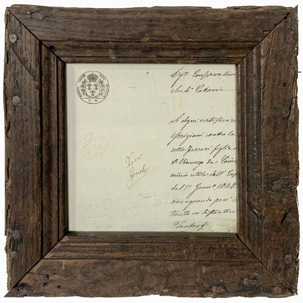 Frammento cartaceo con timbri a secco del Regno delle Due Sicilie e timbro ad inchiostro del Regno delle Due Sicilie, XVIII/XIX secolo. In cornice povera in legno di noce. Cm 25,5x25,5 (3)