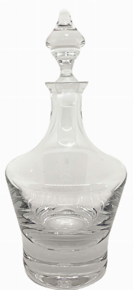 Bottiglia in cristallo pesante, con tappo. 
H cm 32