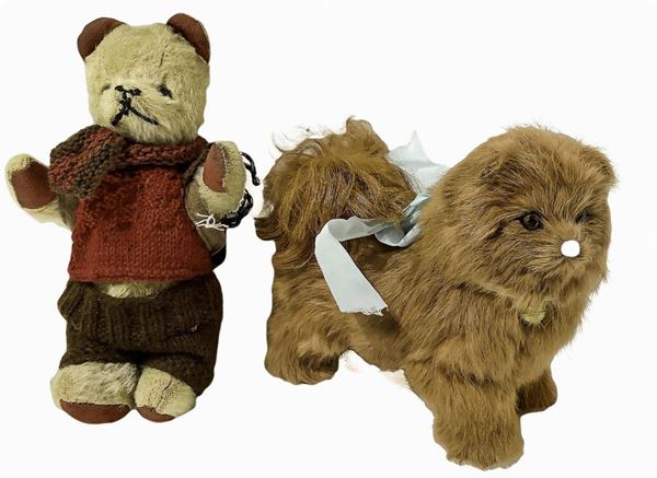 Teddy Bear with red knitted jacket, brown pants, h 23 cm; dog with brown hair and blue bow, h 17 cm, fine 900, Germany origin