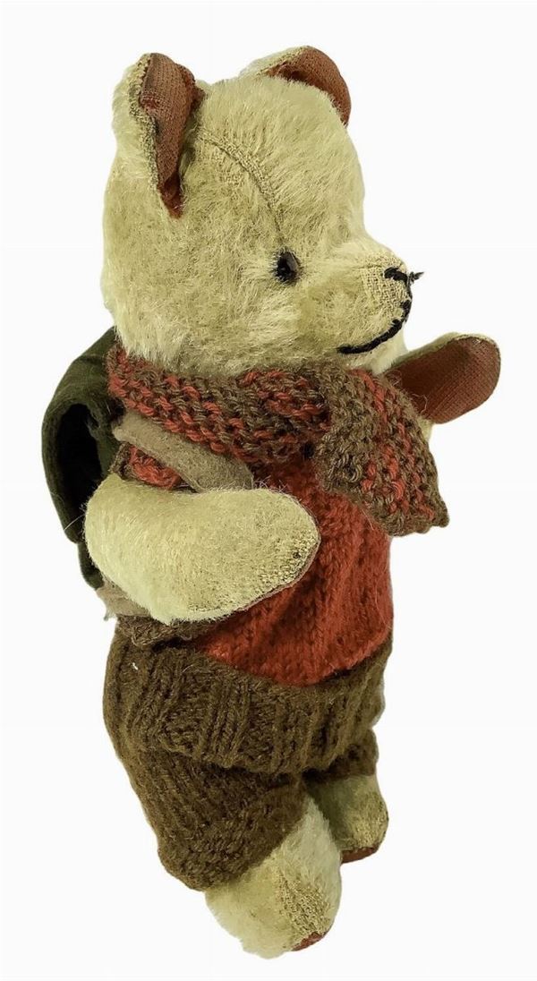 Teddy Bear with red knitted jacket, brown pants, h 23 cm; dog with brown  hair and blue bow, h 17 cm, fine 900, Germany origin - Auction  Collezionismo, Bambole e Fotografia 